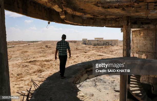 This picture taken on September 9, 2018 shows a view of the destroyed and deserted terminal of the Gaza Strip's former "Yasser Arafat International...