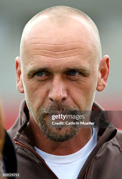 Head coach Holger Stanislawski of FC St. Pauli looks on before a pre-season friendly match between FC St. Pauli and Racing Santander at Millerntor...