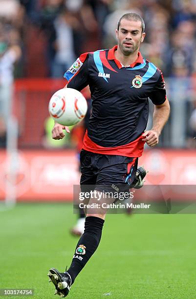 Marc Torrejon Moya of Santander runs with the ball during the pre-season friendly match between FC St. Pauli and Racing Santander at Millerntor...