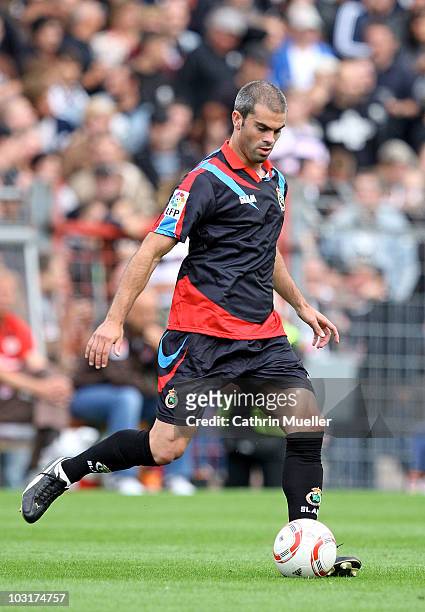Marc Torrejon Moya of Santander runs with the ball during the pre-season friendly match between FC St. Pauli and Racing Santander at Millerntor...