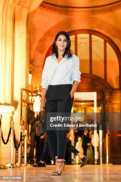 Actress Leila Bekhti is seen, outside the Longchamp 70th Anniversary Celebration at Opera Garnier on September 11, 2018 in Paris, France.