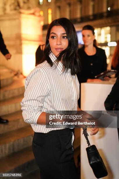 Actress Leila Bekhti is seen, outside the Longchamp 70th Anniversary Celebration at Opera Garnier on September 11, 2018 in Paris, France.