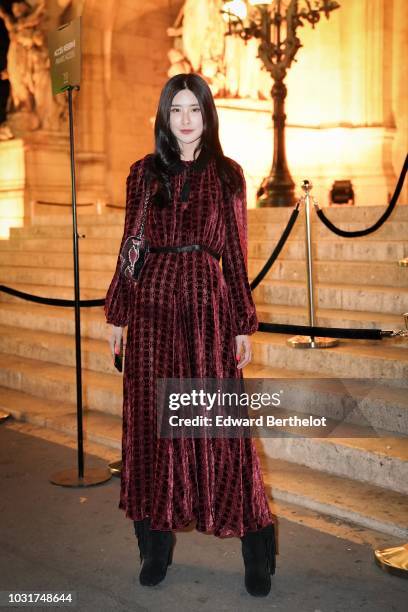 Teaoh Huwei is seen, outside the Longchamp 70th Anniversary Celebration at Opera Garnier on September 11, 2018 in Paris, France.