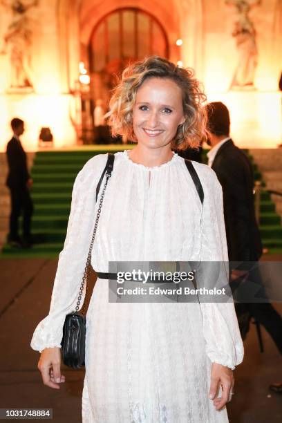 Caroline Roux, journalist, is seen, outside the Longchamp 70th Anniversary Celebration at Opera Garnier on September 11, 2018 in Paris, France.