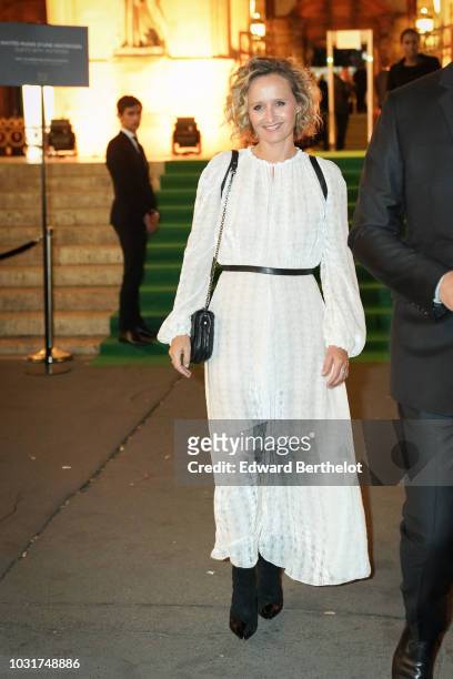 Caroline Roux, journalist, is seen, outside the Longchamp 70th Anniversary Celebration at Opera Garnier on September 11, 2018 in Paris, France.