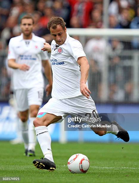 Matthias Lehmann of FC St. Pauli runs with the ball during the pre-season friendly match against Racing Santander at Millerntor Stadium on July 30,...