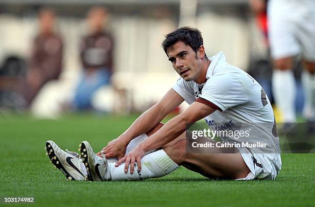 Fin Bartels of FC St. Pauli sitting on the pitch during the pre-season friendly match against Racing Santander at Millerntor Stadium on July 30, 2010...