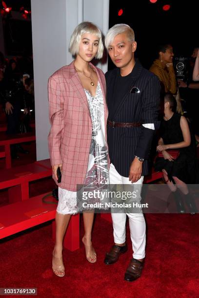 Kim Cam Jones and Bryanboy attend the Calvin Klein Collection front Row during New York Fashion Week at New York Stock Exchange on September 11, 2018...
