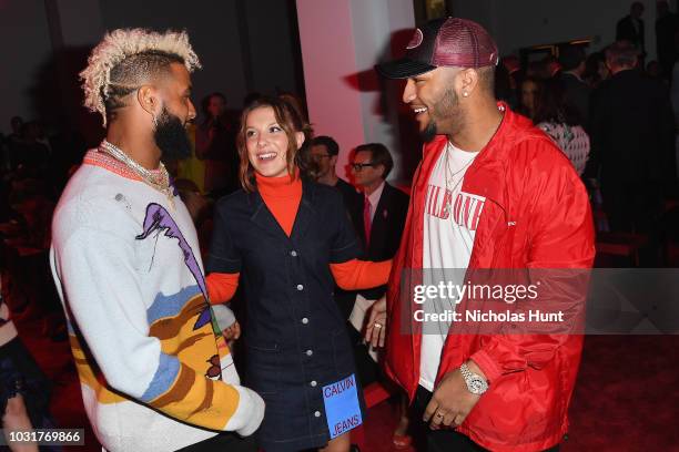 Odell Beckham Jr., Millie Bobby Brown and Ben Beard attend the Calvin Klein Collection front Row during New York Fashion Week at New York Stock...