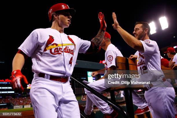 Paul DeJong of the St. Louis Cardinals congratulates Tyler O'Neill of the St. Louis Cardinals after O'Neill's three-run home run against the...