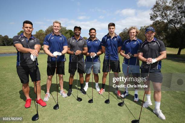 Matt Toomua, Reece Hodge, Kurtley Beale, Tatafu Polota-Nau, Jack Maddocks, Joe Powell and Bernard Foley prepare to tee off at Royal Pines Resort on...