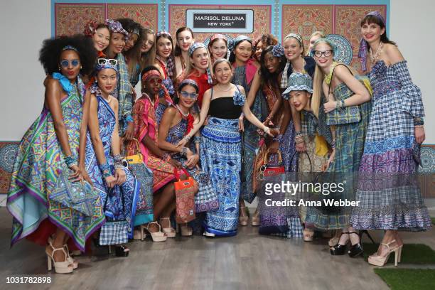 Marisol Deluna poses with models after the Marisol Deluna presentation at Tals Studio on September 11, 2018 in New York City.