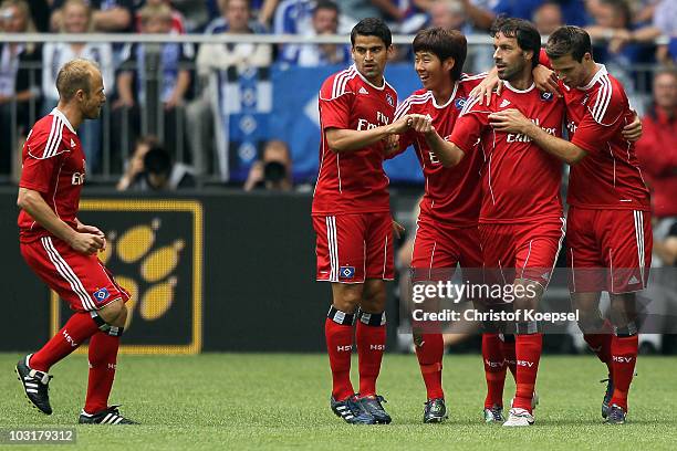 David Jarolim, Gojko Kacar, Heung-Min San, Ruud van Nistelrooy and Tomas Rincon of Hamburg celebrate the first goal during the LIGA total! Cup 2010...