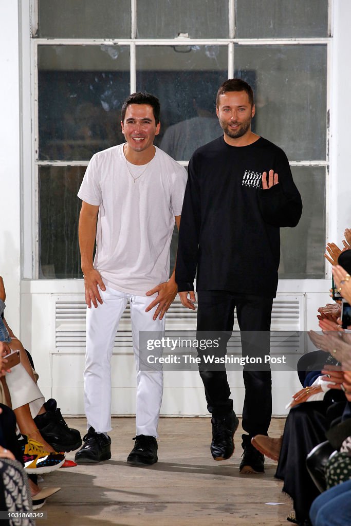 Proenza Schouler designers Lazarro Hernandez and Jack McCullough take a bow after presenting their Spring Summer 2019 Collection.
