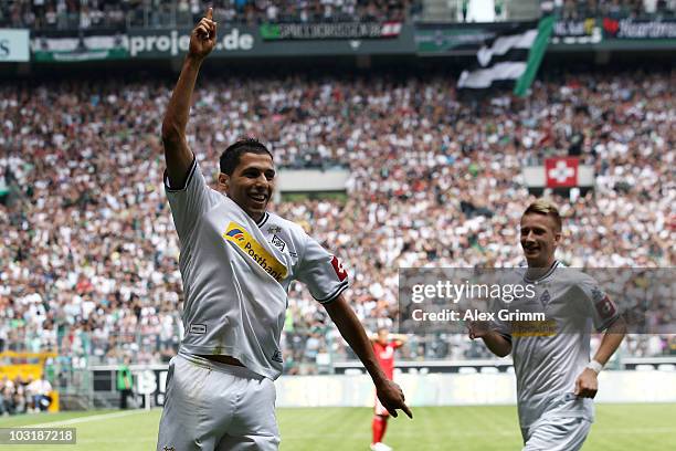 Karim Matmour of M'Gladbach celebrates his team's first goal with team mate Marco Reus during the pre-season friendly match between Borussia...