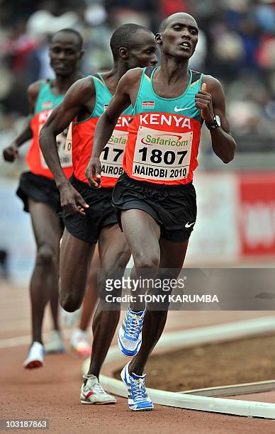 Kenya's Vincent Yator runs ahead of compatriots during the Men's 5000 metres final event on August 1, 2010 during the fifth day the17th CAA African...