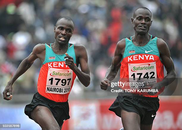 Kenya's Edwin Soy overlaps compatriot Mark Kiptoo on his way to winning the Men's 5000 metres final event August 1, 2010 during the fifth day the17th...