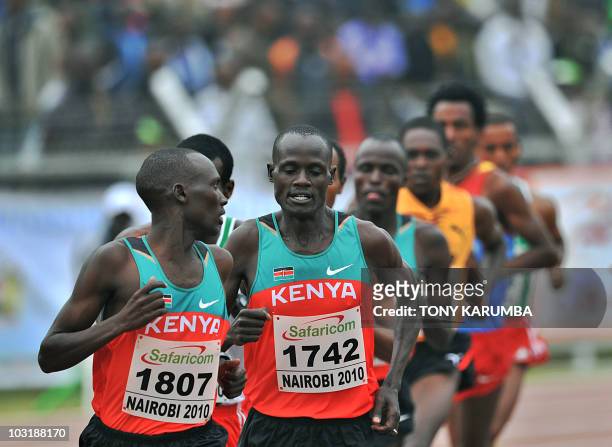 Kenya's Vincent Yator looks back at compatriot Mark Kiptoo during the Men's 5000 metres final event on August 1, 2010 on the fifth day the 17th CAA...