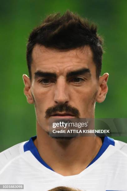 Greece's midfielder Lazaros Christodoulopoulos listens to anthem ahead of the Nations League football match between Hungary and Greece on September...