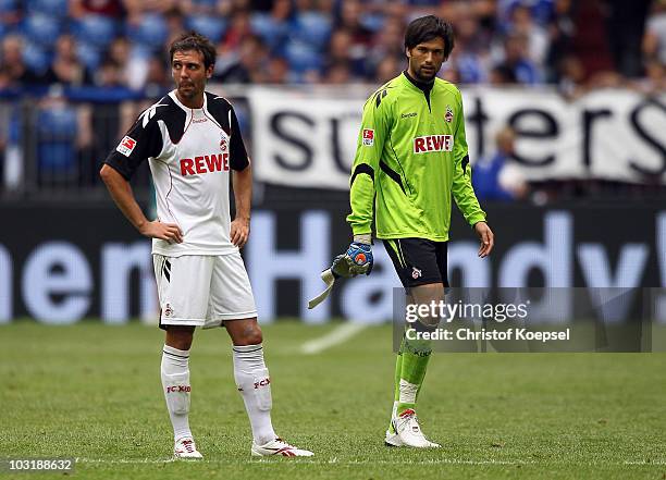 Fabrice Ehret and Miro Varvodic of Koeln look dejected after losing 0-3 the LIGA total! Cup 2010 third place play-off match between Hamburger SV and...