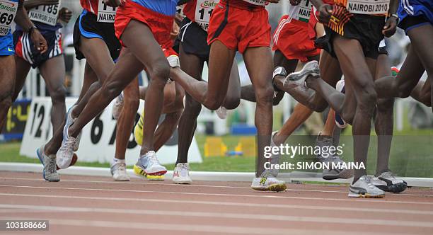 Athletes run in the 5000M men final 01 August 2010 on the fifth day the17th CAA African Atheletics Championships in Nairobi.Kenyans Edwin Soy won...