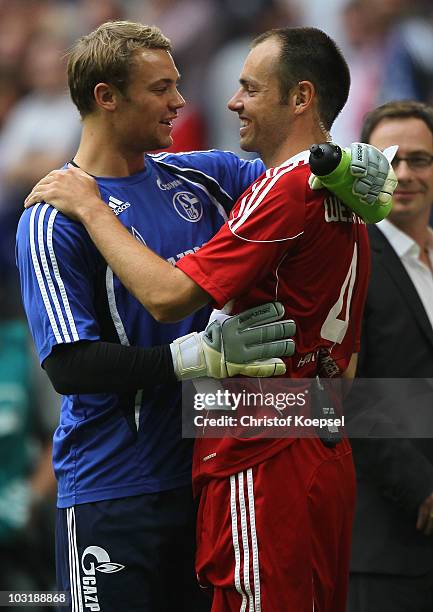 Manuel Neuer of Schalke embraces Heiko Westermann of Hamburg after the LIGA total! Cup 2010 third place play-off match between Hamburger SV and 1. FC...