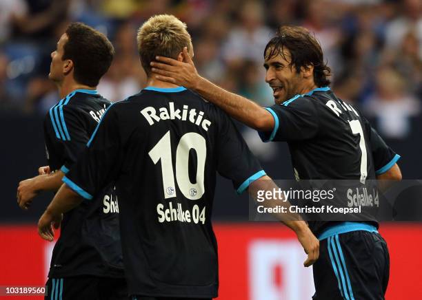 Raul Gonzalez of Schalke celebrates the second goal with Ivan Rakitic during the LIGA total! Cup 2010 final match between FC Bayern Muenchen and FC...