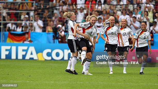 Kim Kulig of Germany celebrates after scoring the 2nd goal during the 2010 FIFA Women's World Cup Final match between Germany and Nigeria at the FIFA...