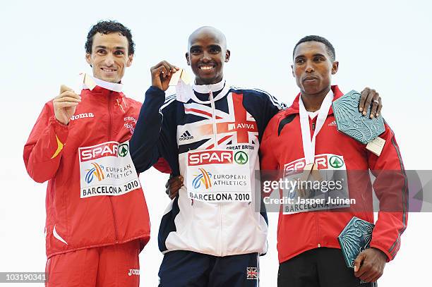 Jesus Espana of Spain receives the silver medal, Mo Farah of Great Britain receives the gold medal and Hayle Ibrahimov of Azerbaijan receives the...