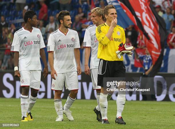 David Alaba, Diego Contento, Maximillian Haas and Rouven Sattelmeier of Bayern look dejected after losing 1-3 the LIGA total! Cup 2010 final match...