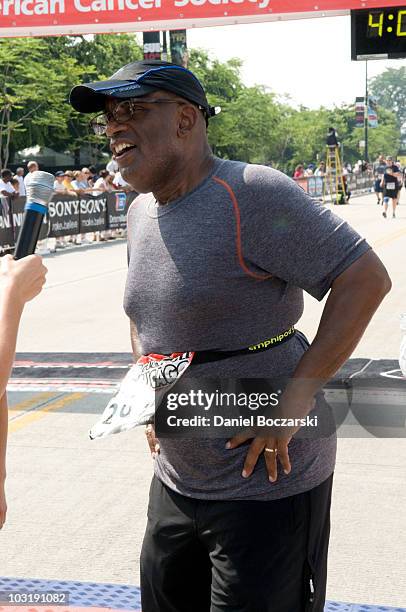 Al Roker crosses the finish line at the Rock 'n' Roll Chicago Half Marathon on August 1, 2010 in Chicago, Illinois.