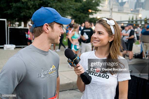 Jake Pavelka and Maria Menounos attend the Rock 'n' Roll Chicago Half Marathon on August 1, 2010 in Chicago, Illinois.