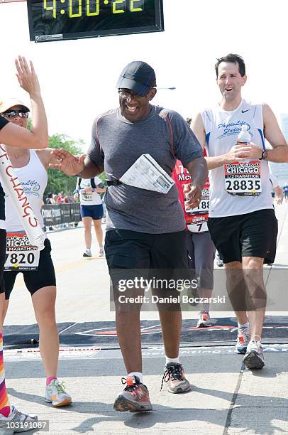 Al Roker crosses the finish line at the Rock 'n' Roll Chicago Half Marathon on August 1, 2010 in Chicago, Illinois.