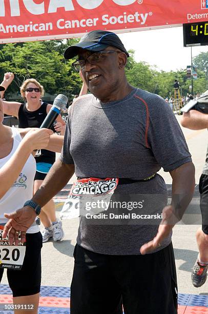 Al Roker crosses the finish line at the Rock 'n' Roll Chicago Half Marathon on August 1, 2010 in Chicago, Illinois.