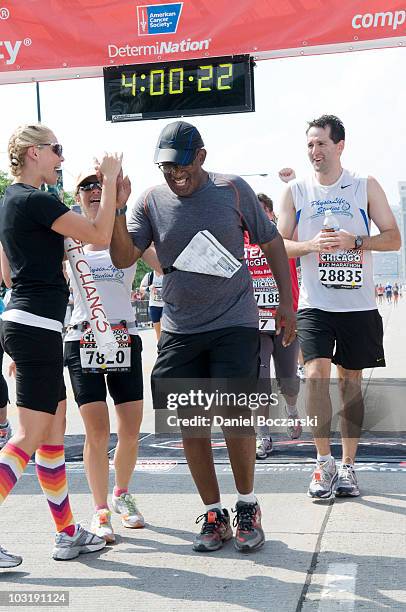 Al Roker crosses the finish line at the Rock 'n' Roll Chicago Half Marathon on August 1, 2010 in Chicago, Illinois.