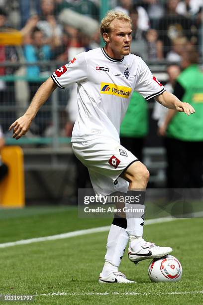 Tobias Levels of M'Gladbach runs with the ball during the pre-season friendly match between Borussia M'Gladbach and Liverpool at the Borussia Park...