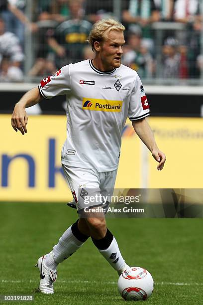 Tobias Levels of M'Gladbach runs with the ball during the pre-season friendly match between Borussia M'Gladbach and Liverpool at the Borussia Park...