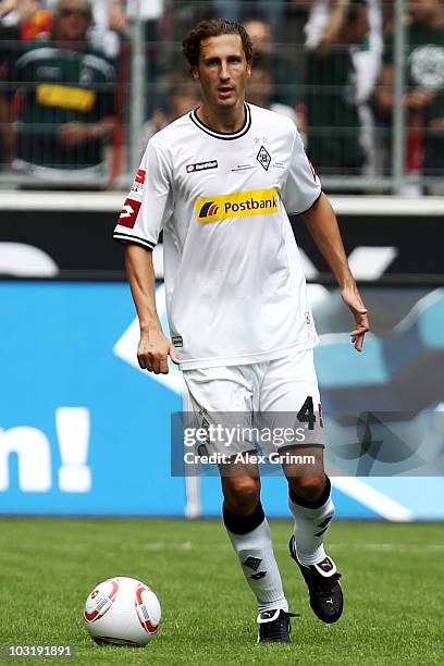 Roel Brouwers of M'Gladbach runs with the ball during the pre-season friendly match between Borussia M'Gladbach and Liverpool at the Borussia Park...