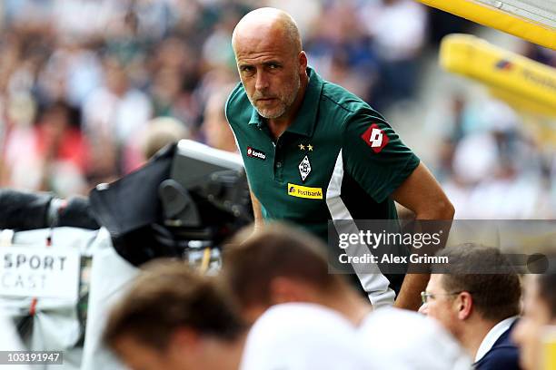 Head coach Michael Frontzeck of M'Gladbach looks on during the pre-season friendly match between Borussia M'Gladbach and Liverpool at the Borussia...