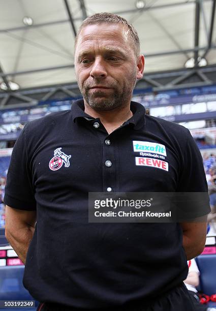 Assistant coach Thomas Haessler of Koeln looks on during the LIGA total! Cup 2010 third place play-off match between Hamburger SV and 1. FC Koeln at...