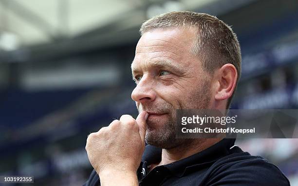 Assistant coach Thomas Haessler of Koeln looks on during the LIGA total! Cup 2010 third place play-off match between Hamburger SV and 1. FC Koeln at...