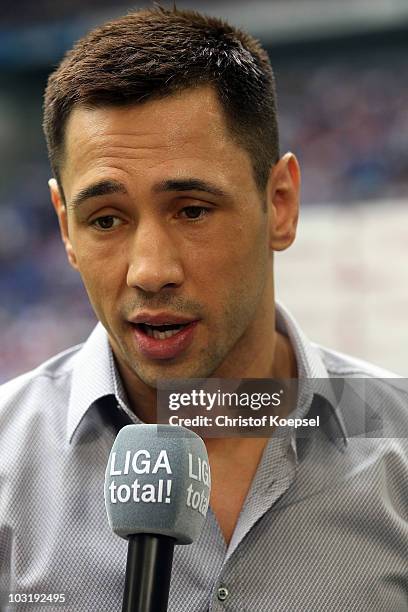 Boxer Felix Sturm speaks to t-home television channel during the LIGA total! Cup 2010 third place play-off match between Hamburger SV and 1. FC Koeln...