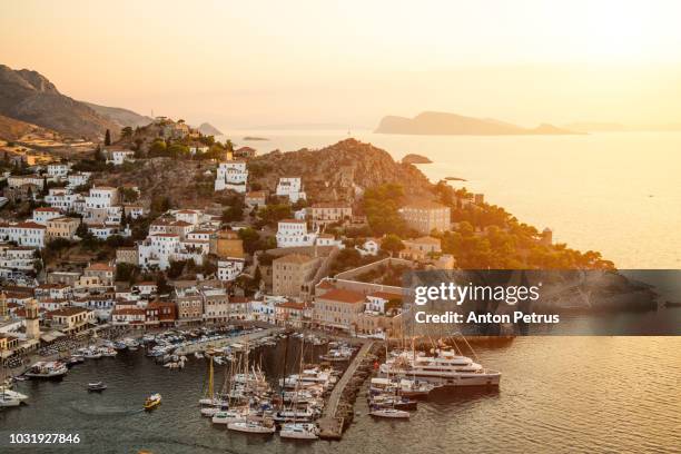 beautiful sunset at hydra island, greece - attica greece stock pictures, royalty-free photos & images