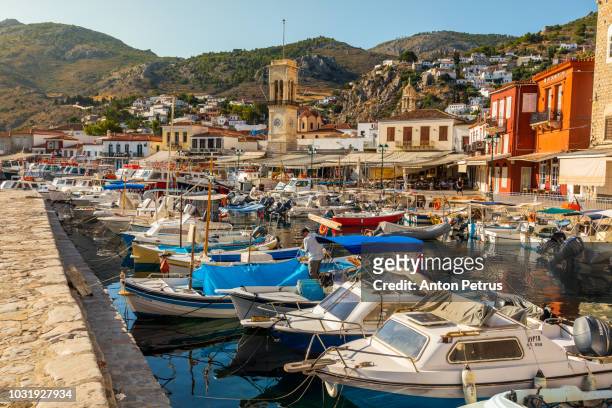 fishing boats on hydra island, greece - hydra greece fotos stockfoto's en -beelden