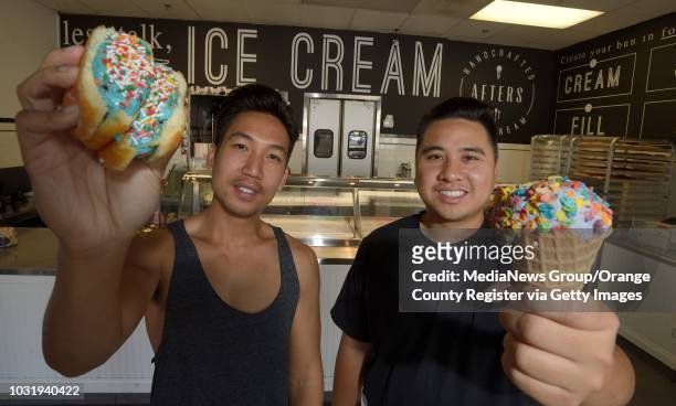 Scott Nghiem, left, and Andy Nguyen, co-owners of Afters Ice Cream in their Fountain Valley store on Wednesday. The pair have three stores in Orange...