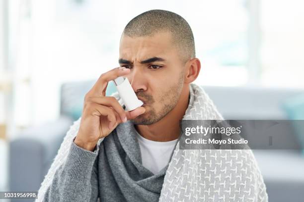 giving the lungs a little assistance - asthmatic stock pictures, royalty-free photos & images