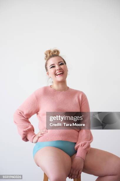 curvy woman laughing - voluptuous body stock pictures, royalty-free photos & images