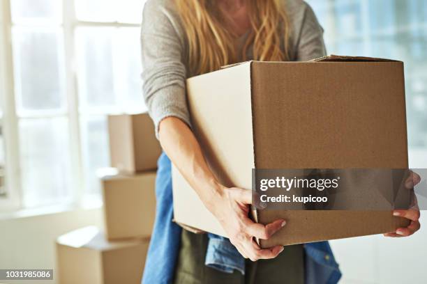 just one more box and i'm done - woman carrying stock pictures, royalty-free photos & images