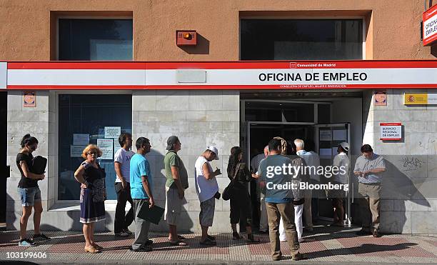 Jobseekers line up at an employment center in Madrid, Spain, on Monday, Aug. 2, 2010. The Spanish government may consider stopping payments to people...