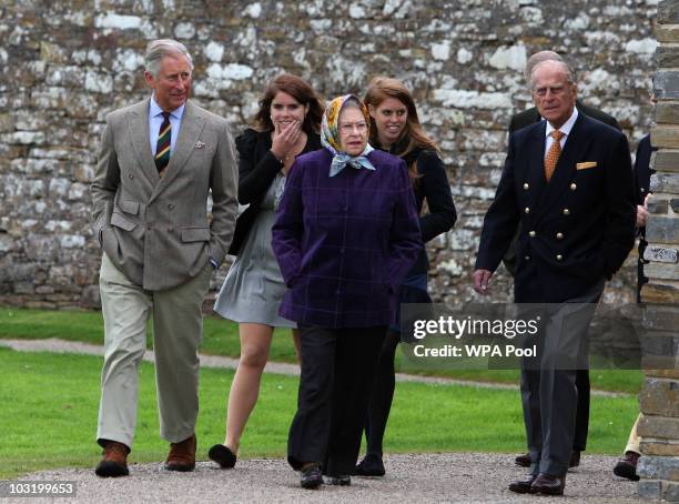 Queen Elizabeth II accompanied by Prince Charles, Prince of Wales , Prince Philip, Duke of Edinburgh , Princess Eugenie, , and Princess Beatrice and...